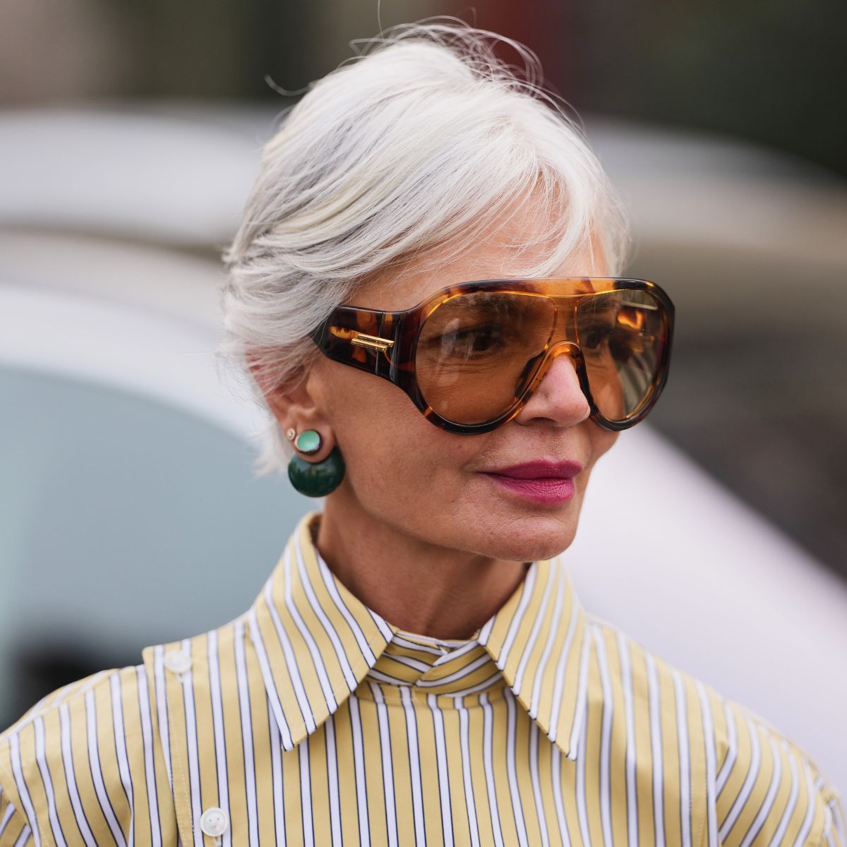 grece ghanem headshot wearing oversized sunglasses