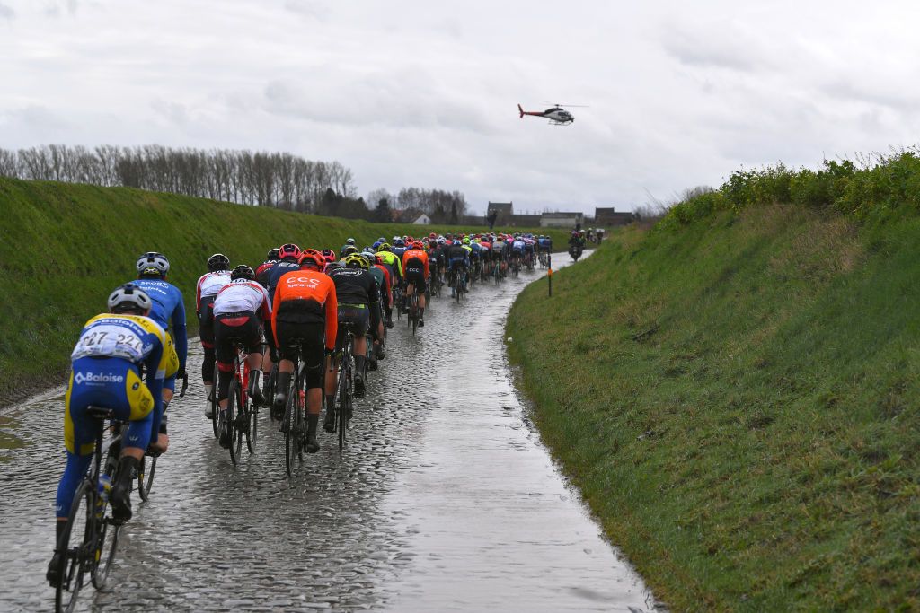 NINOVE BELGIUM FEBRUARY 29 Holleweg Cobblestones Peloton Fans Public Helicopter Landscape during the 75th Omloop Het Nieuwsblad 2020 Men Race a 200km race from Ghent to Ninove OmloopHNB OHN20 on February 29 2020 in Ninove Belgium Photo by Tim de WaeleGetty Images