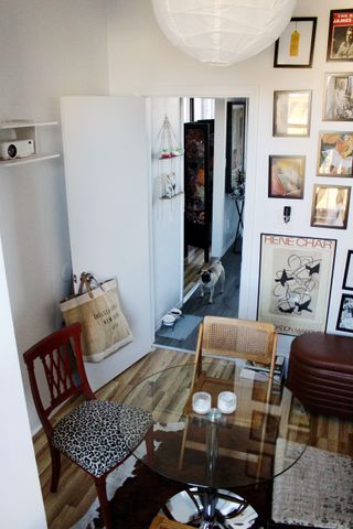 Apartment dining area with a gallery wall