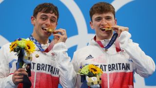 Team GB divers Tom Daley and Matty Lee pose with their gold medals