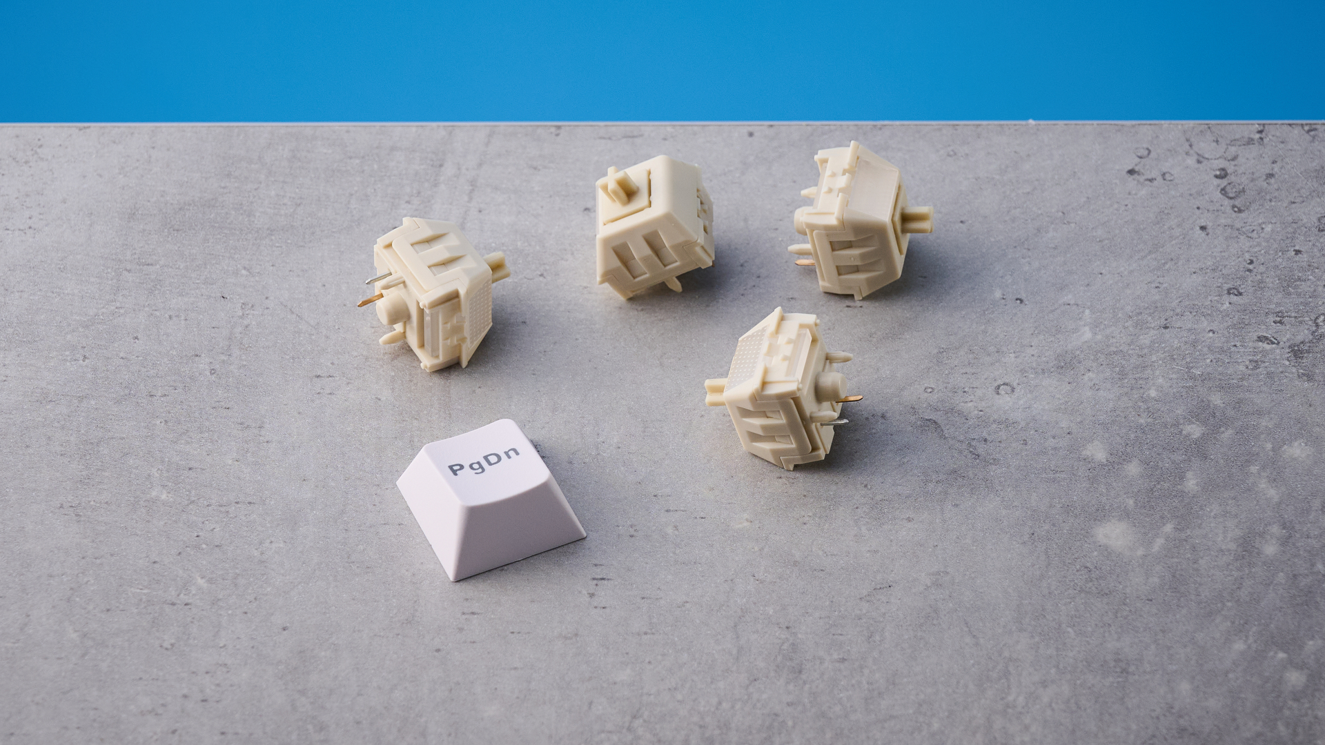 Wobkey Zen 65 mechanical keyboard photographed in front of a blue background