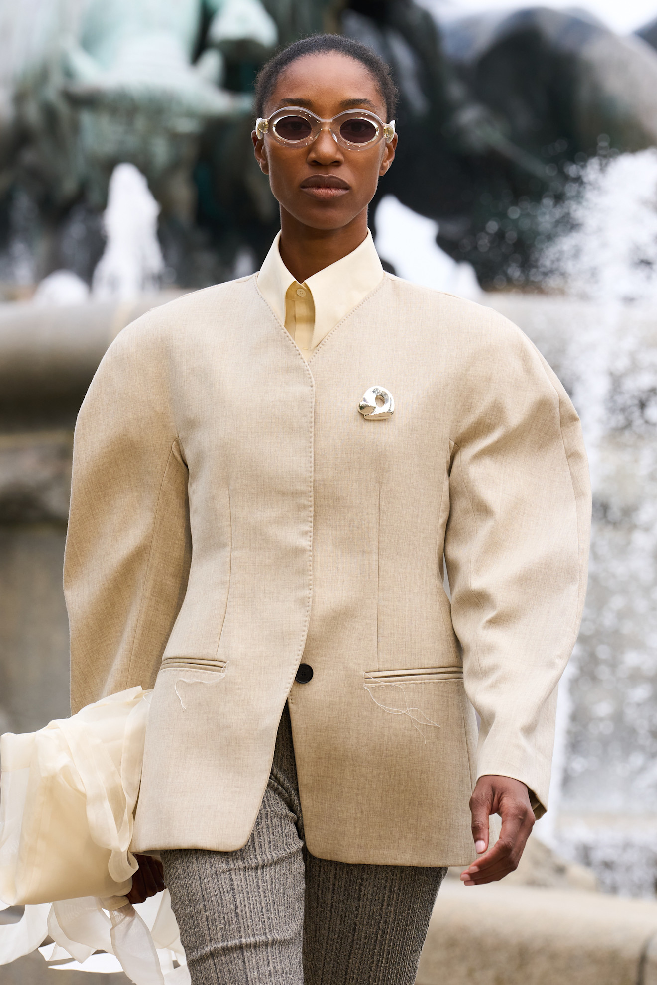 Photo of model walking in MKDT Spring suMMER 2026 show.