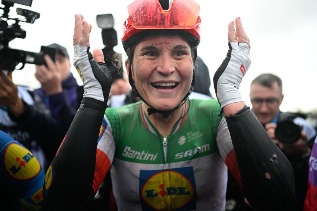 Italian Elisa Longo Borghini of Lidl-Trek celebrates after winning the women's race of the 'Ronde van Vlaanderen/ Tour des Flandres/ Tour of Flanders' one day cycling event, 163km with start and finish in Oudenaarde, Sunday 31 March 2024. BELGA PHOTO JASPER JACOBS (Photo by JASPER JACOBS / BELGA MAG / Belga via AFP)
