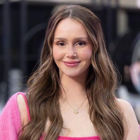 MIKAYLA MATTHEWS poses in a pink sweater in a promo shot for the secret lives of mormon wives