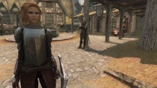 Best Skyrim mods — a player character stands in Whiterun's market, blissfully unassailed by NPC chatter.