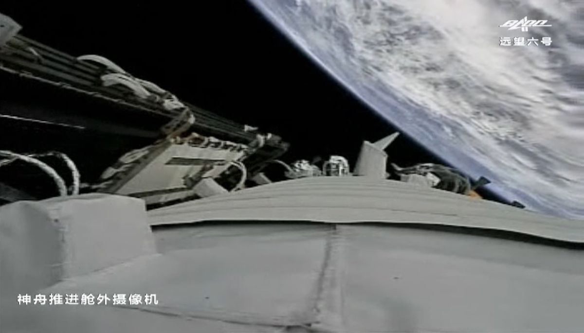 A camera aboard China's Shenzhou 12 spacecraft captured this view of of the Earth below shortly after solar array deployment.