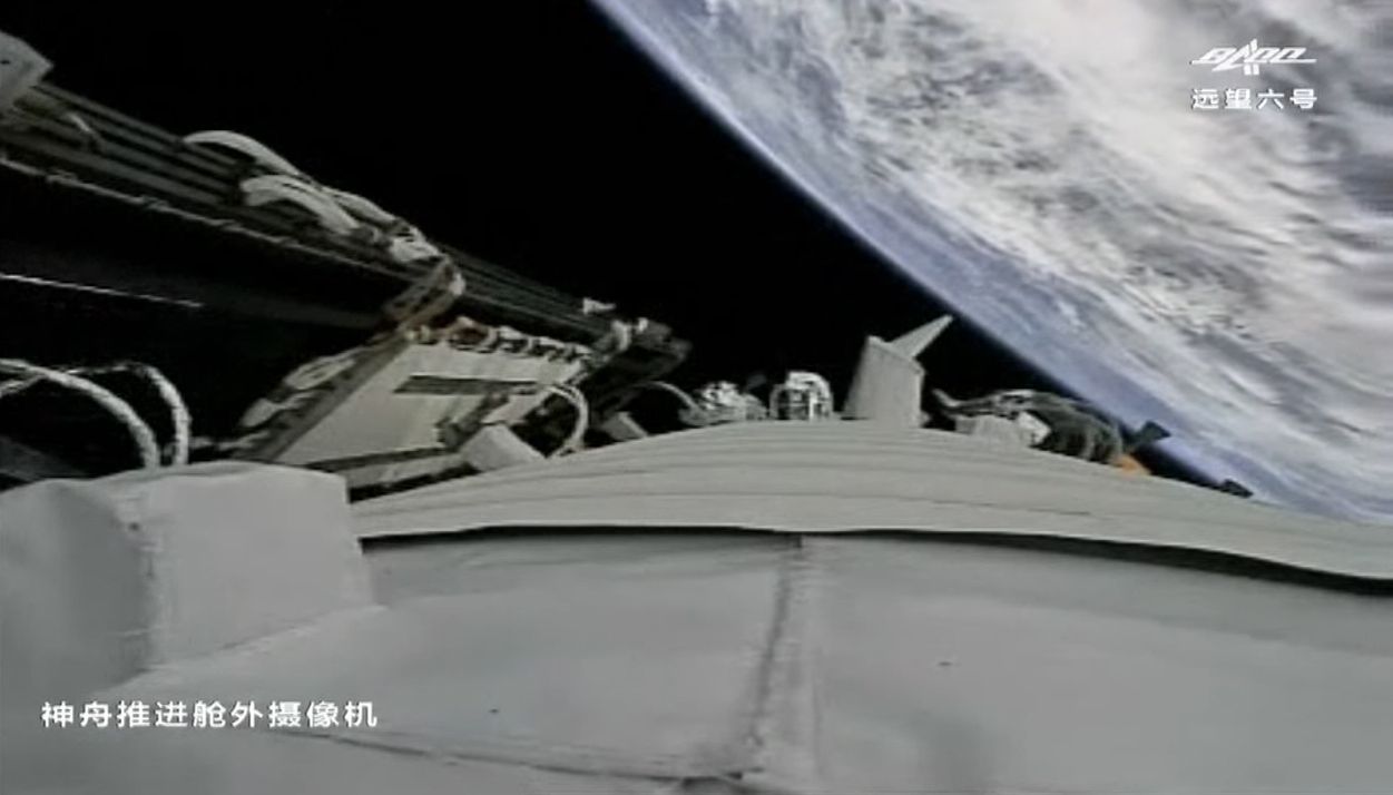 A camera aboard China's Shenzhou 12 spacecraft captured this view of of the Earth below shortly after solar array deployment.