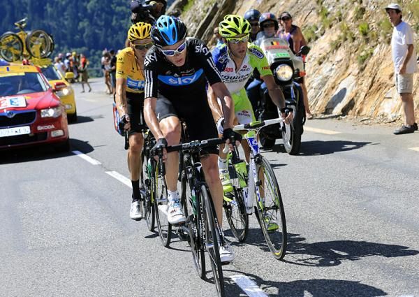 The Tour's top three GC men, Bradley Wiggins, Chris Froome and Vincenzo Nibali, climb to the summit of the Peyresourde.