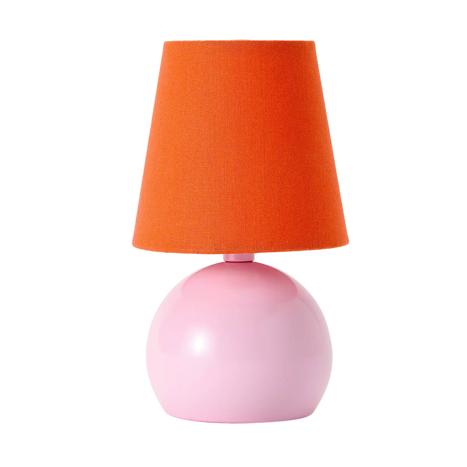 A pink table lamp with an orange lampshade