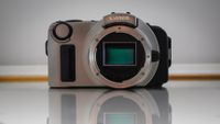 Canon camera on a mirrored surface