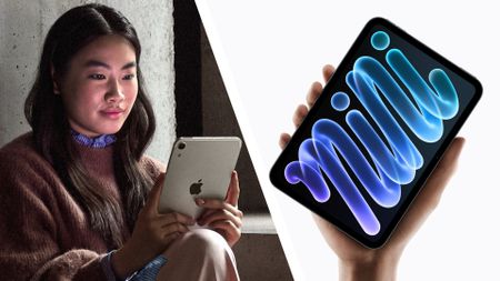 The iPad mini (2026) being held in the hand