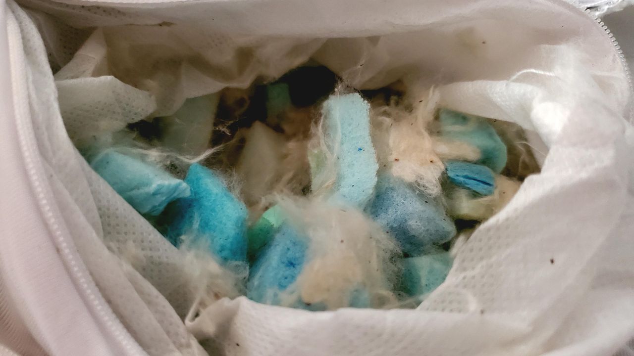 Image shows inside the extra bag of fill you get with the Layla Kapok Pillow