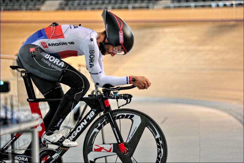 Jan Barta warms up on the E-118 Next before testing it in the Velodrome