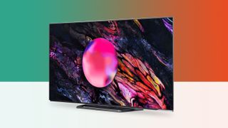 Hisense A85K OLED TV on white surface with colored background