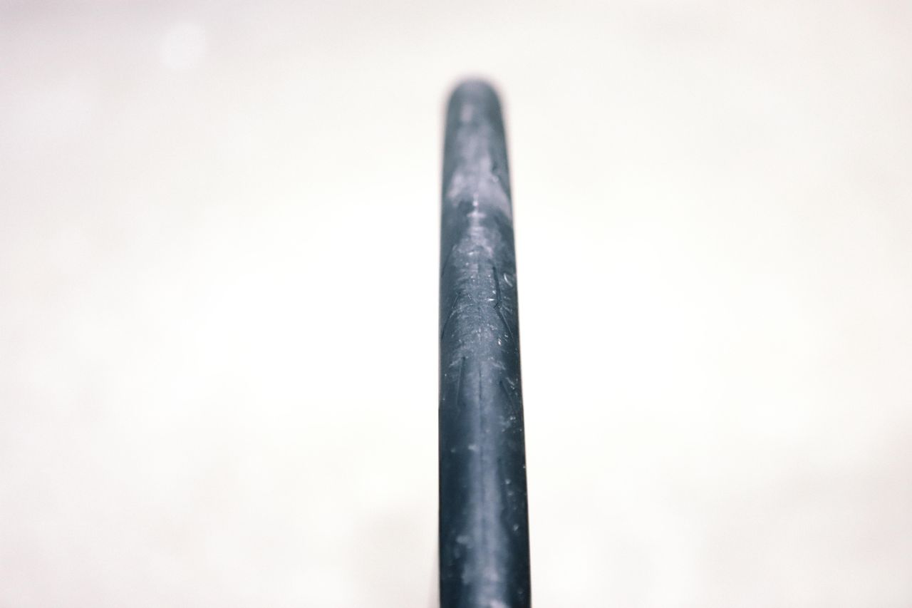 a close up of a black road bike tyre