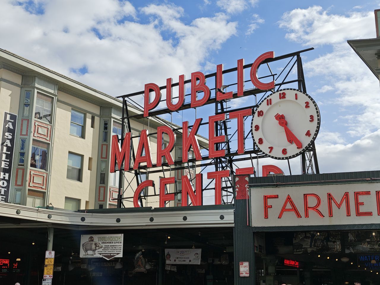 A red Public Market Center sign