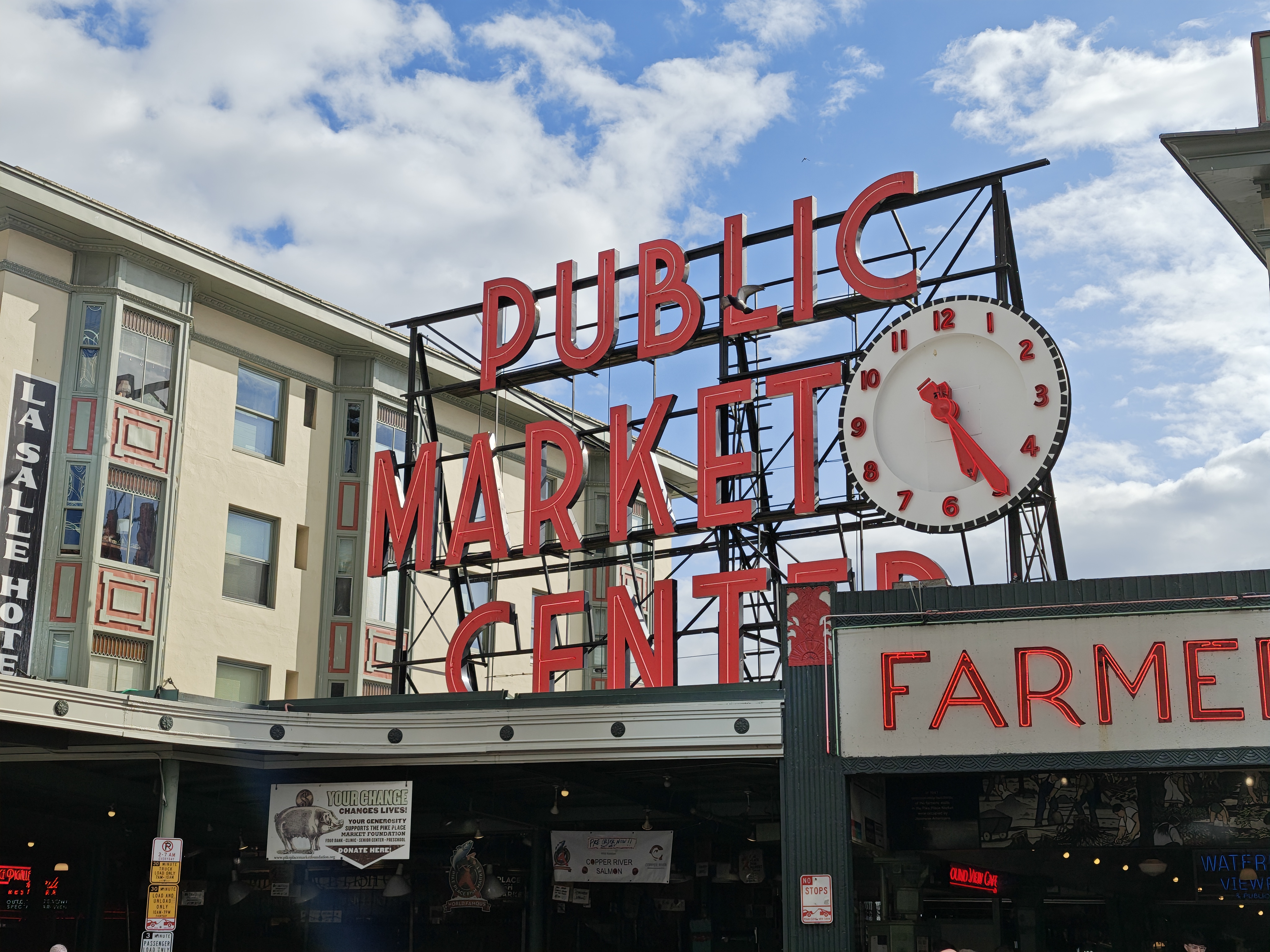 A red Public Market Center sign
