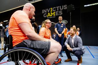Prince Harry, Duke of Sussex greets athletes during the launch of the Invictus Games on May 9, 2019 in The Hague, Netherlands.