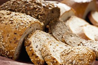 Side profile of homemade wholemeal bread, which you can make using plain flour