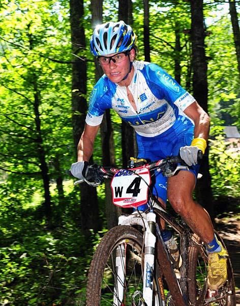 Katerina Nash (Luna Women's MTB) riding fifth.