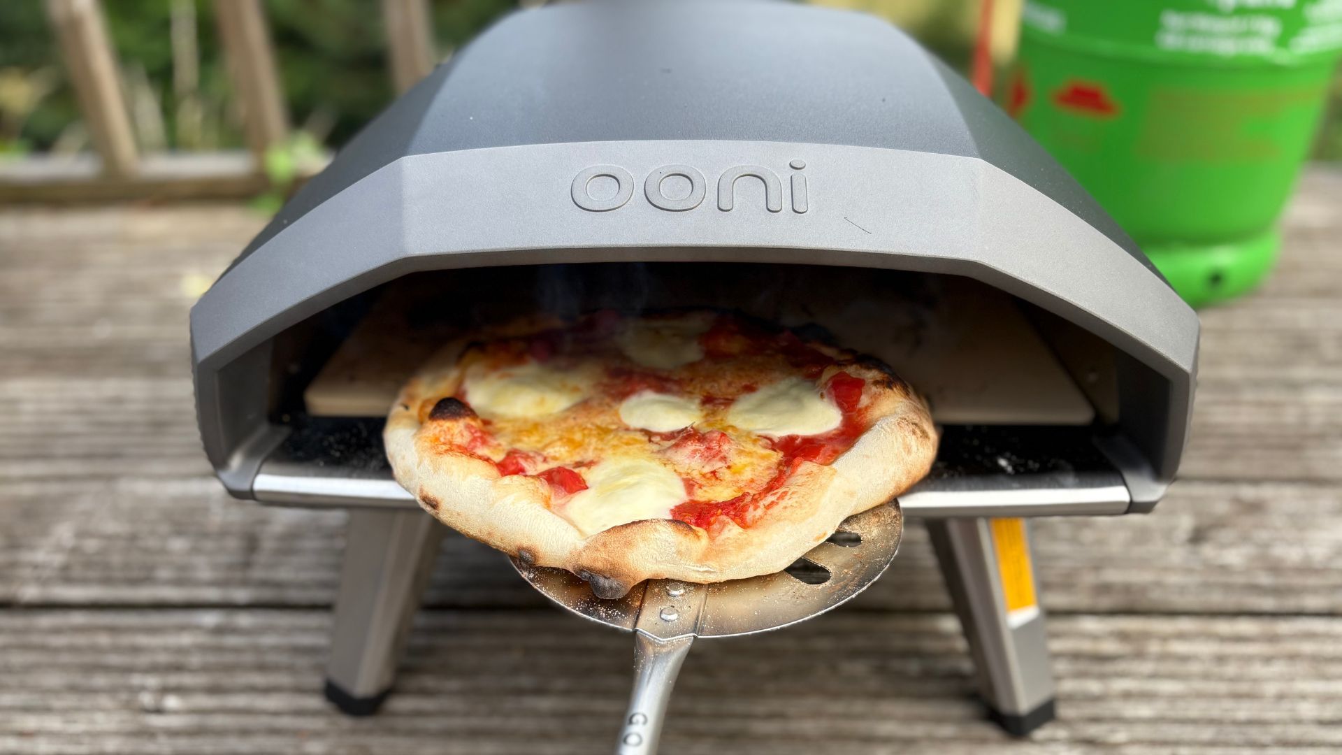 Pulling pizza out of the Ooni Koda 14 2nd Generation