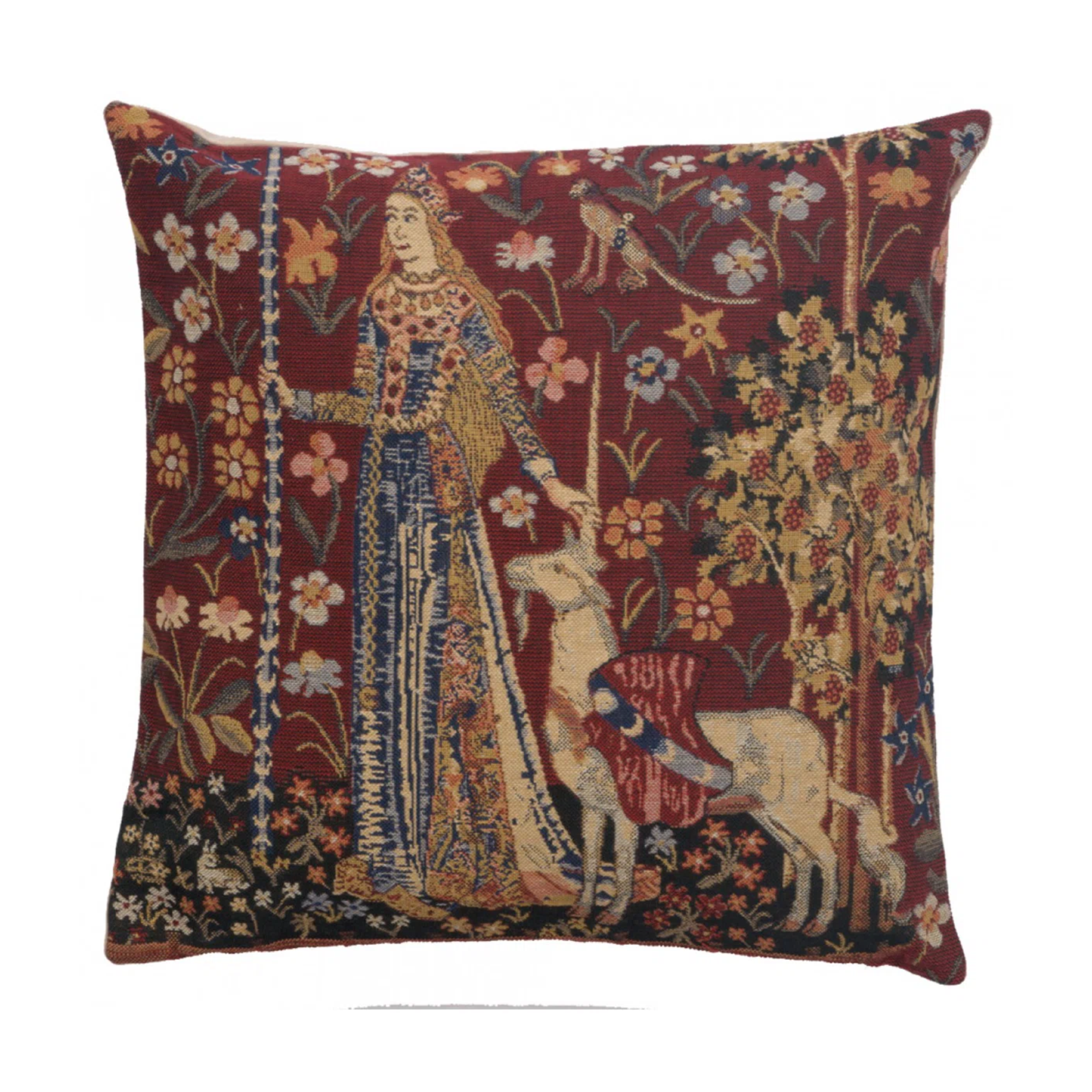 a vintage inspired pillow with a woman in medieval era clothing and a unicorn at her side