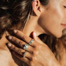 Self-tan with SPF a woman with tanned skin in the sun