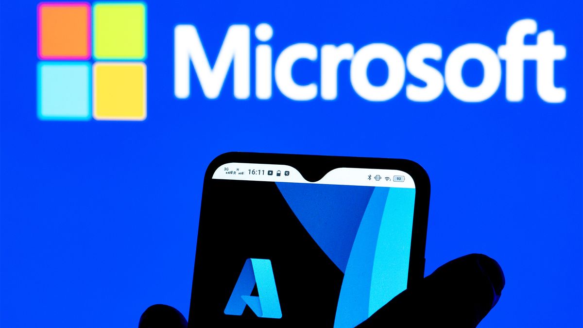 Microsoft Azure logo pictured on a smartphone screen with Microsoft logo and branding in background.