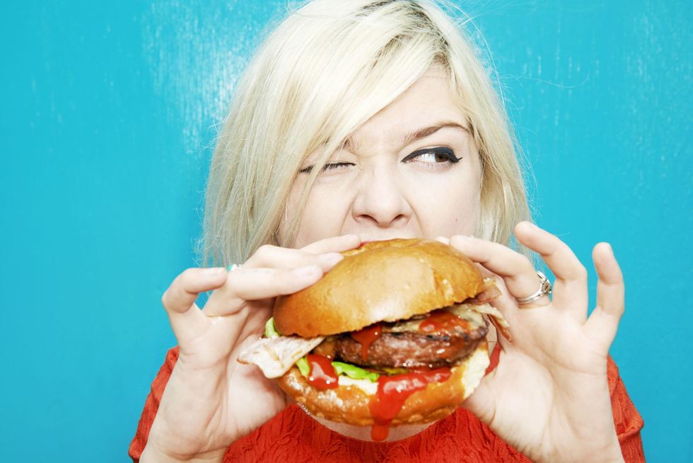 Woman Eating Burger