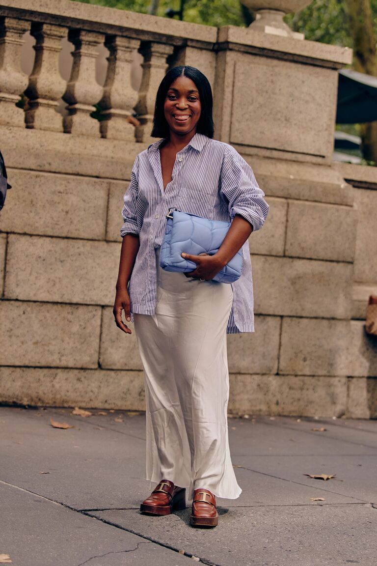 woman at fashion week wearing a loafer outfit