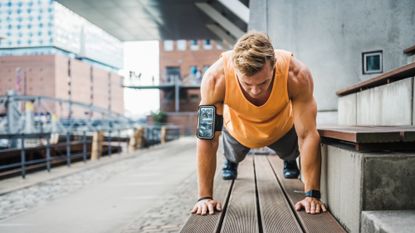 Man doing a push up outdoors