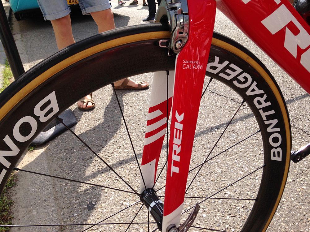 The front brake is tucked into the fork and head tube.