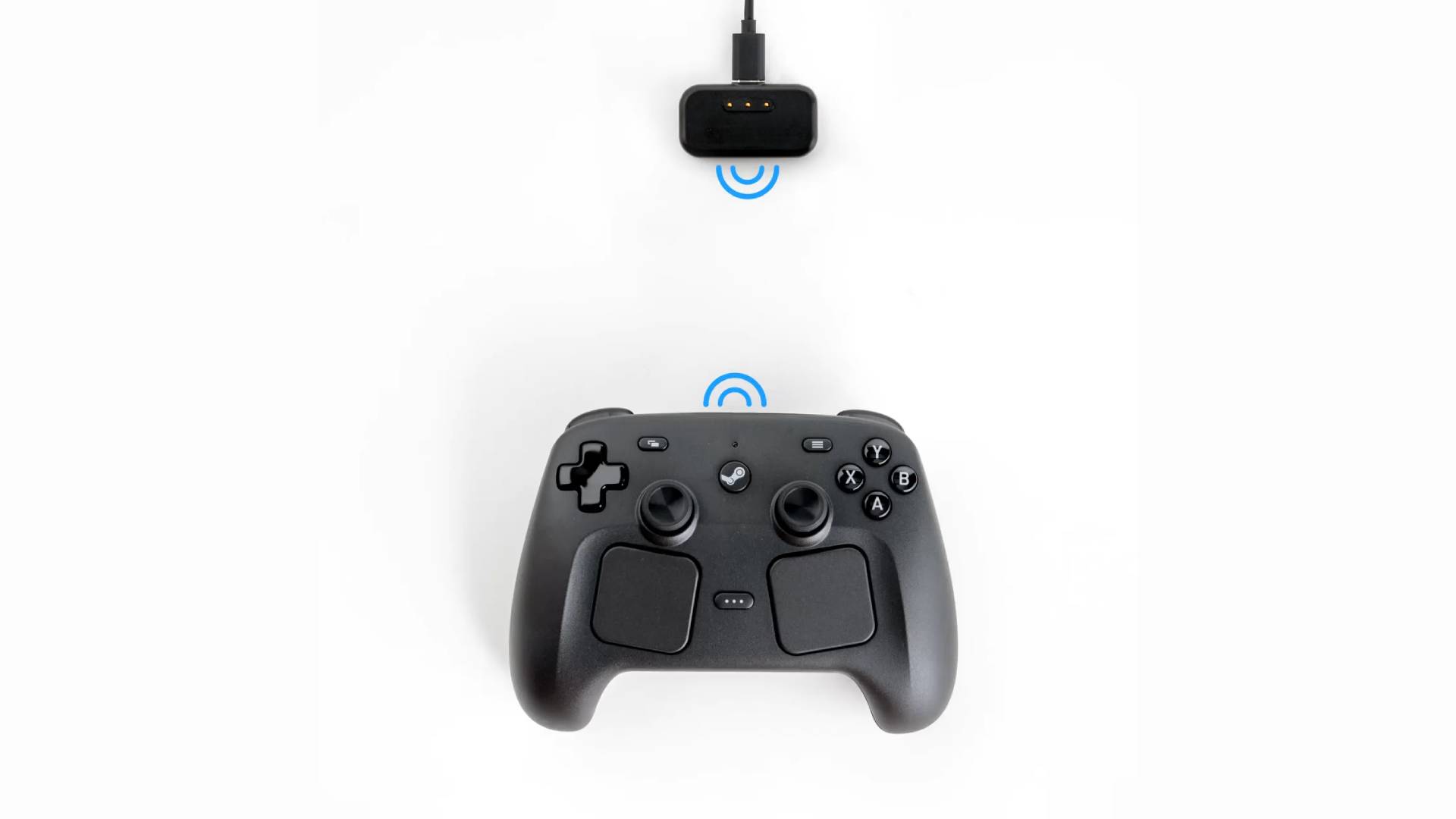 Steam Controller with Puck above and blue lines representing wireless connectivity.