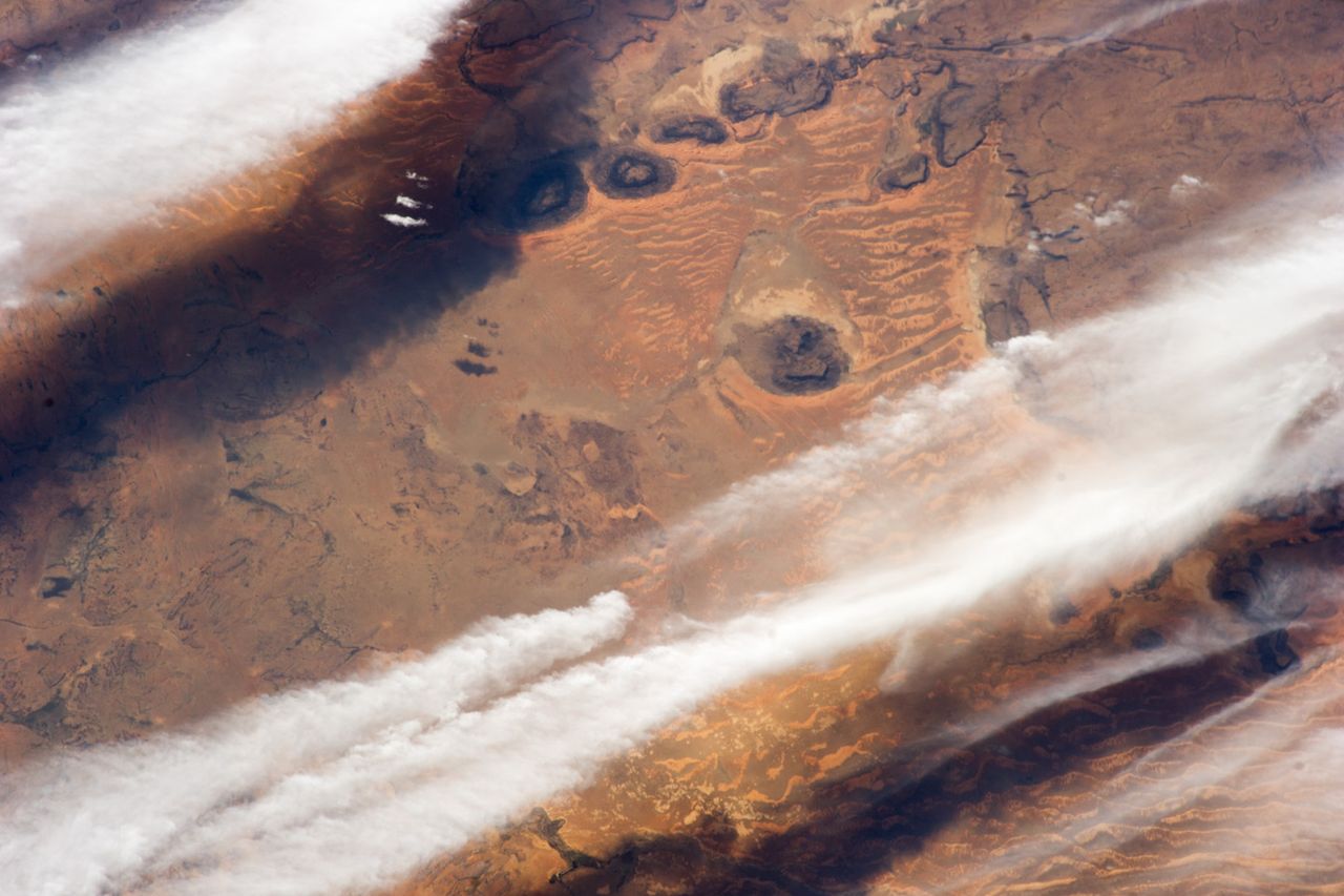 This 2014 photo from the International Space Station shows cloud bands over southern Mauritania in the Sahara Desert.