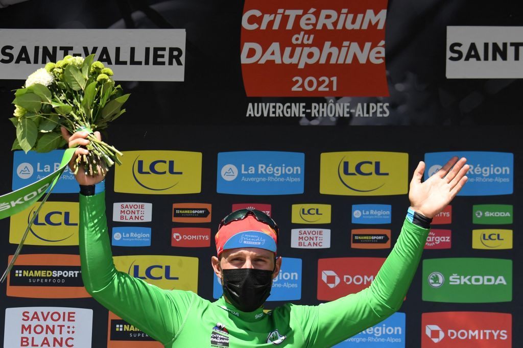 Team Bahrains Sonny Colbrelli of Italy celebrates his best sprinters green jersey on the podium at the end of the fifth stage of the 73rd edition of the Criterium du Dauphine cycling race a 175km between SaintChamond and SaintVallier on June 3 2021 Photo by Alain JOCARD AFP Photo by ALAIN JOCARDAFP via Getty Images
