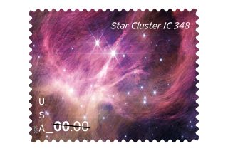 closeup of a postage stamp showing a telescope photo of a colorful purple gas cloud in space