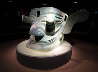 A bronze mask with protruding eyes from the Sanxingdui culture.