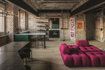 Camaleonda sofa by Mario Bellini for B&B Italia upholstered in Ego Bordeaux. Hanging Nest Egg chair and cushions by Studio Sterling. Icelandic sheepskin rug by Cuero Interiors from Etsy.