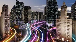 Glowing light trails surround the smart city. (3d render)