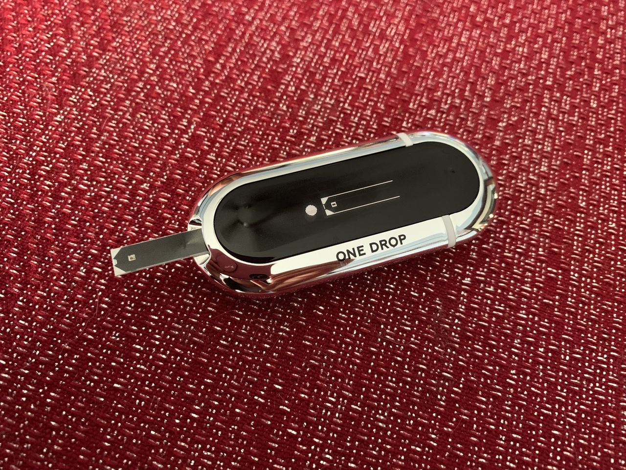 One Drop Chrome meter with test strip inserted