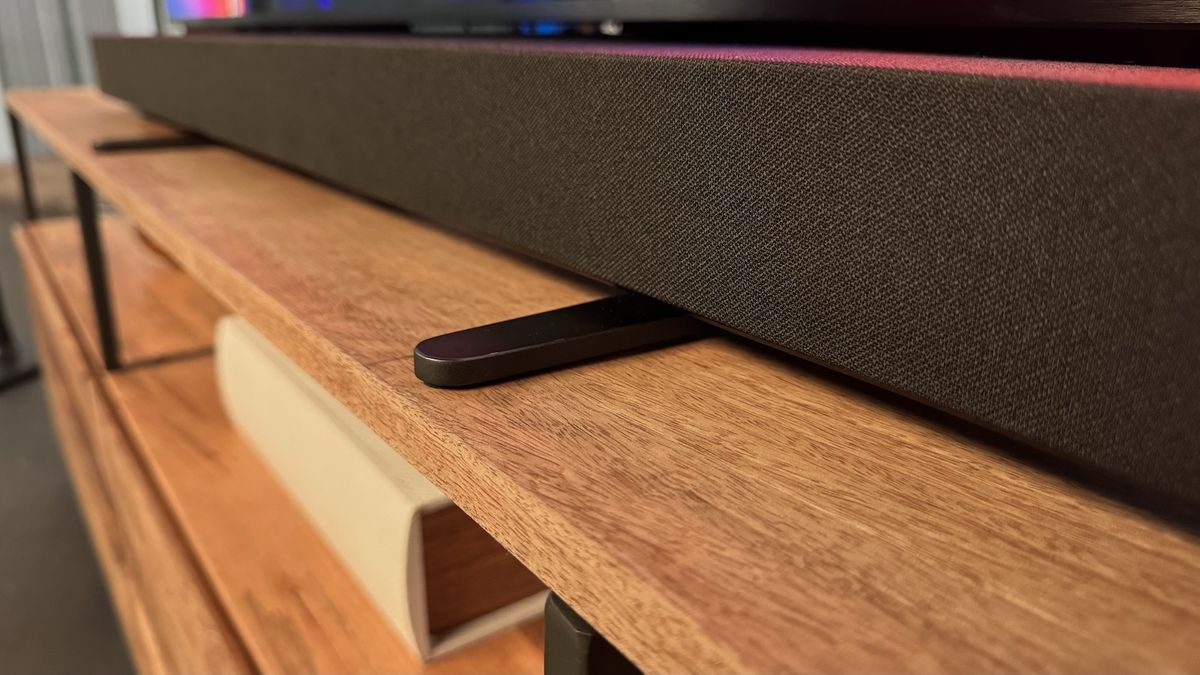 Sony Bravia Theatre Bar 9 soundbar sitting across one of the Bravia 9 TV's feet