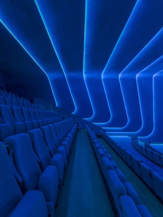 Bright blue cinema screening room at SKP in Xi'an, China