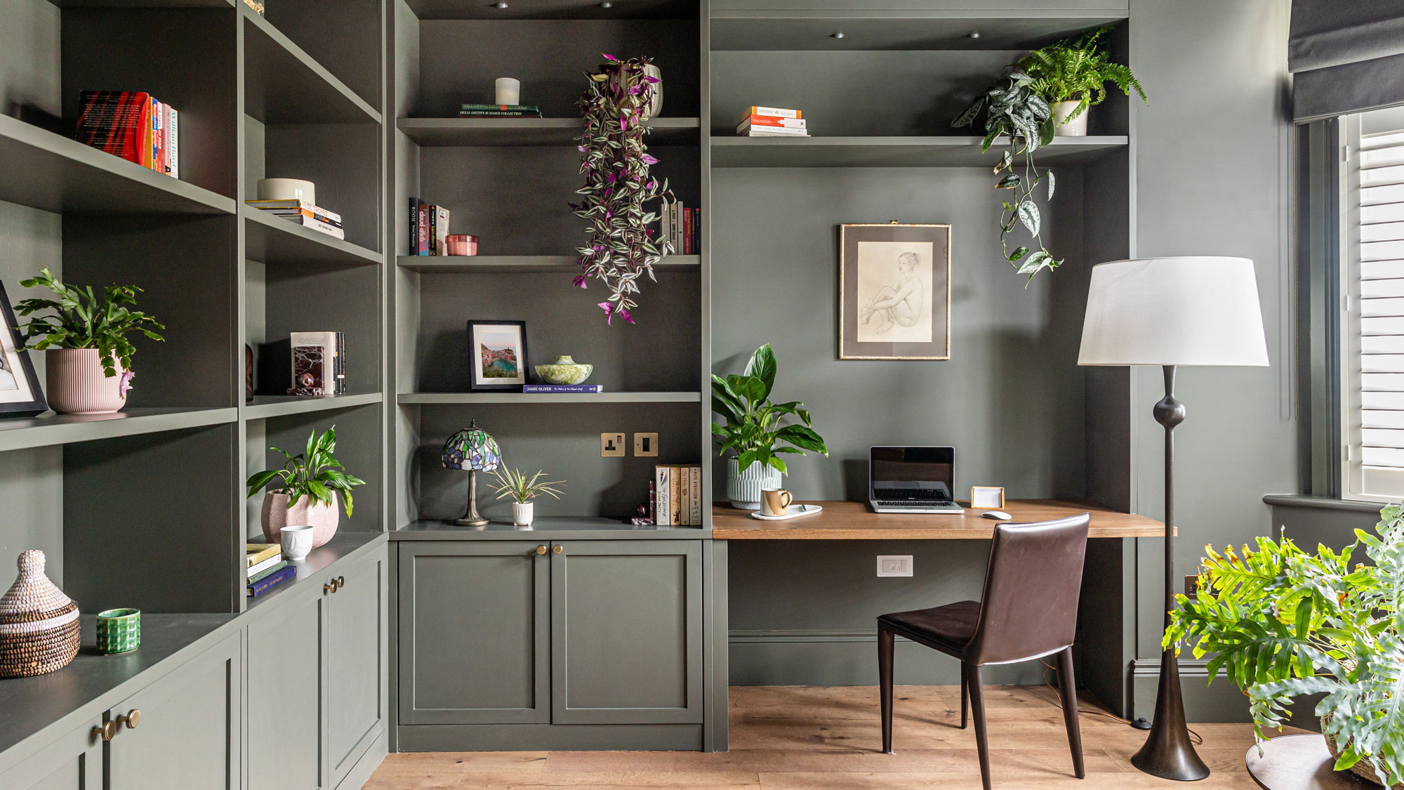 green home office with fitted furniture