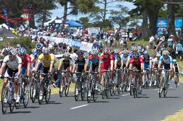 The peloton head towards the sharp left-hander out of the home straight