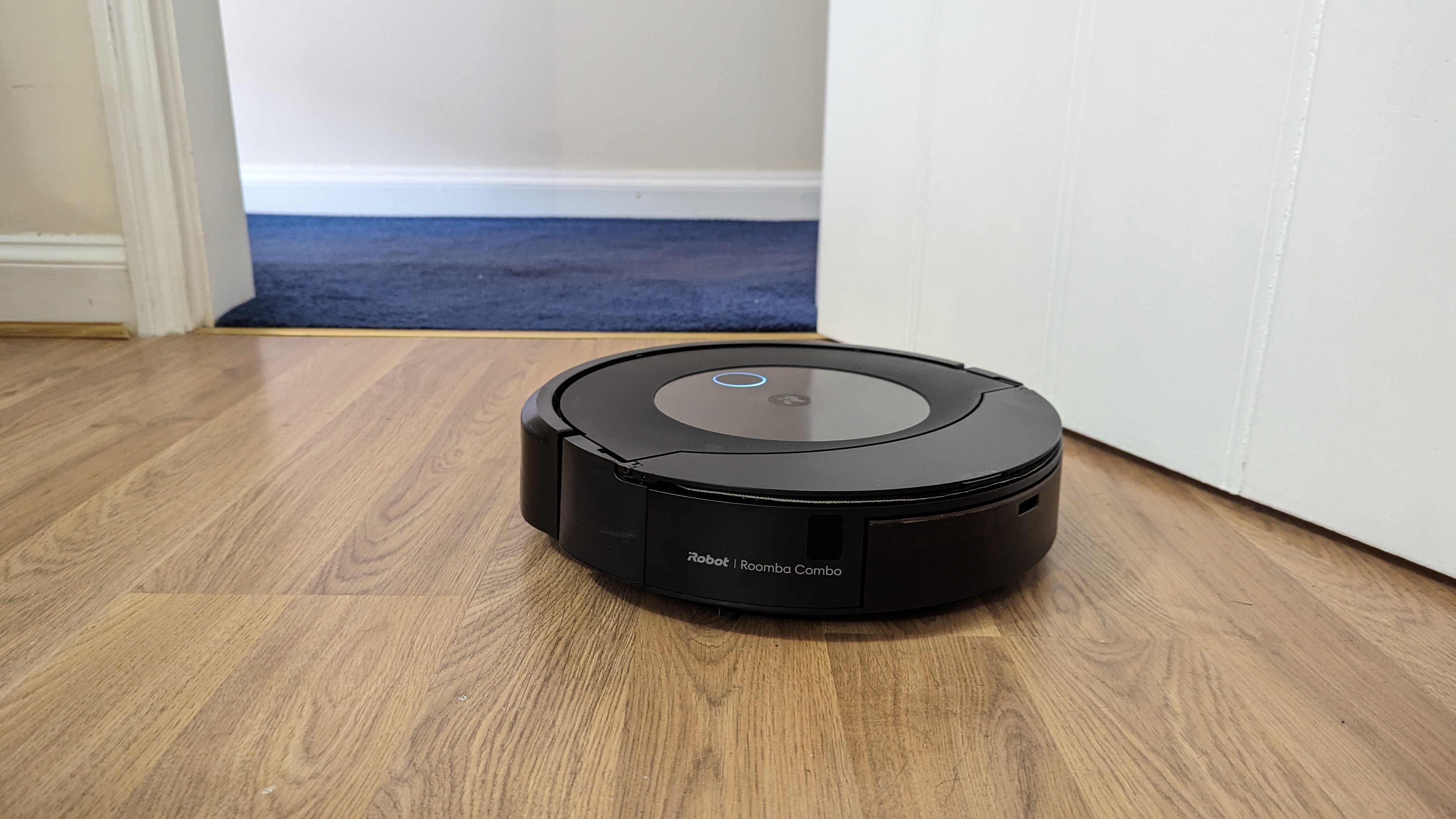The Roomba Combo J9 Plus cleaning a hard floor