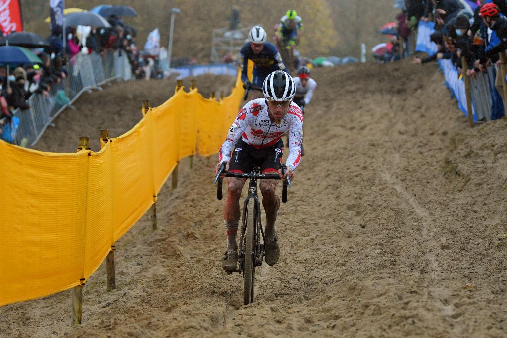 KOKSIJDE BELGIUM NOVEMBER 21 Eli Iserbyt of Belgium and Team Pauwels Sauzen Bingoal competes during the 50th Koksijde UCI CycloCross Worldcup 2021 Mens Elite CXWorldCup on November 21 2021 in Koksijde Belgium Photo by Luc ClaessenGetty Images