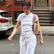 woman in white t-shirt and white jeans