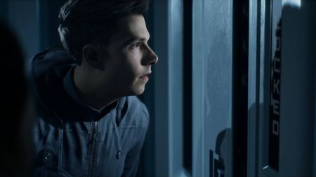 Carter looking through a locked door in Directive 8020