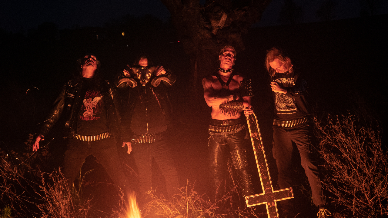 Desaster looking scary in the woods with a fire