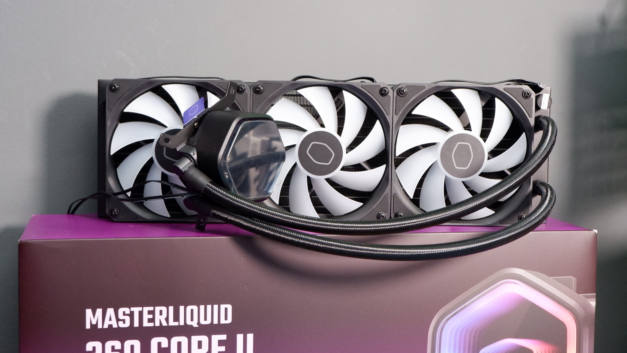 A Cooler Master MasterLiquid 360 Core II liquid cooler set-up on a test bench.